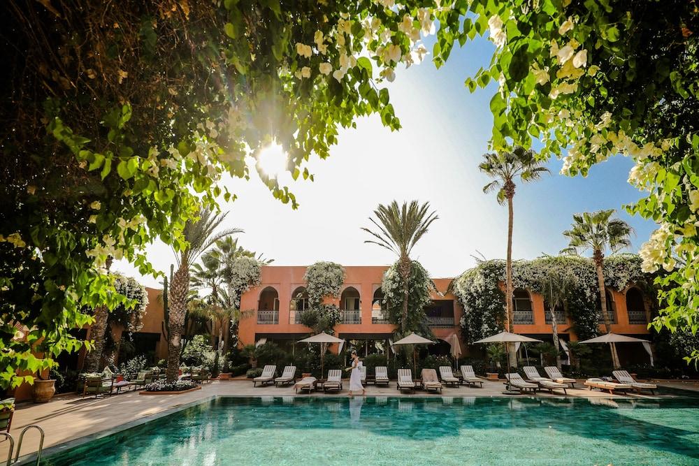 Tikida Golf Palace Agadir Exterior photo The swimming pool at the hotel
