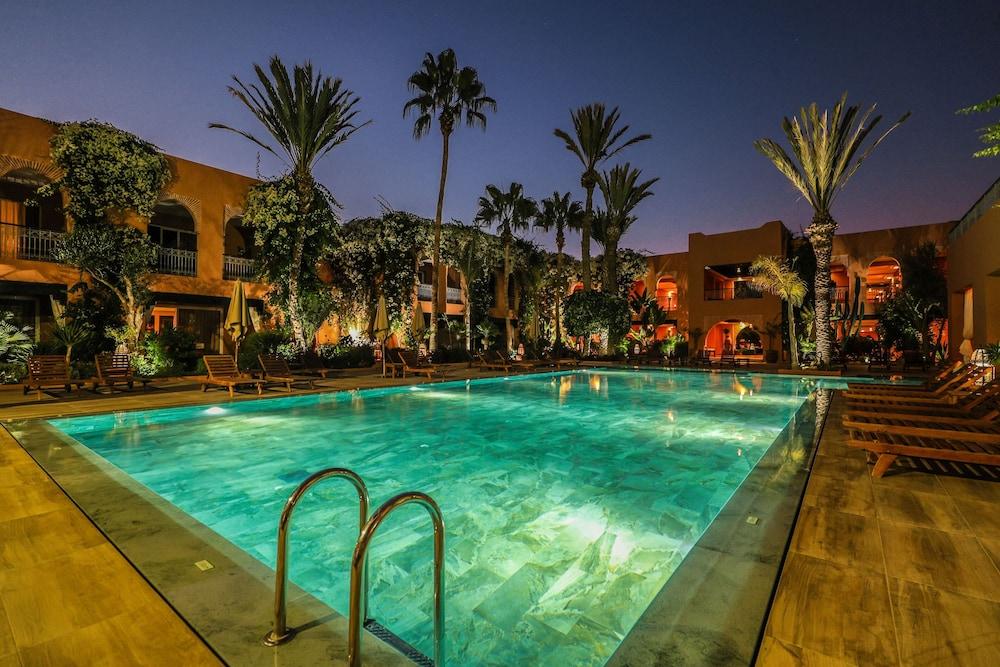 Tikida Golf Palace Agadir Exterior photo The swimming pool at the hotel