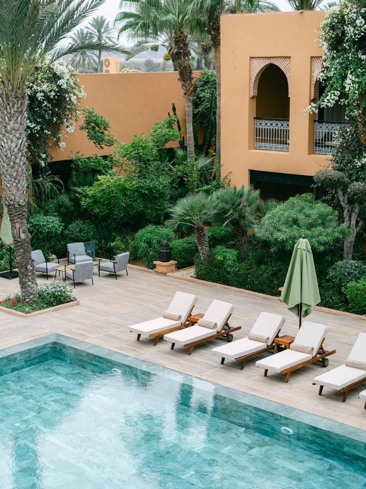 Tikida Golf Palace Agadir Exterior photo The pool at the hotel
